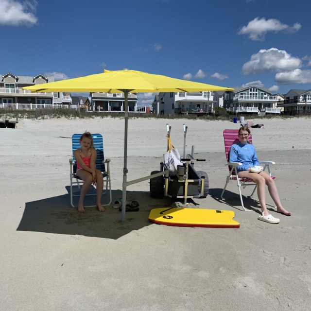 Connect umbrella to beach chair