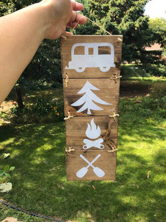 minimalistic wooden camping sign